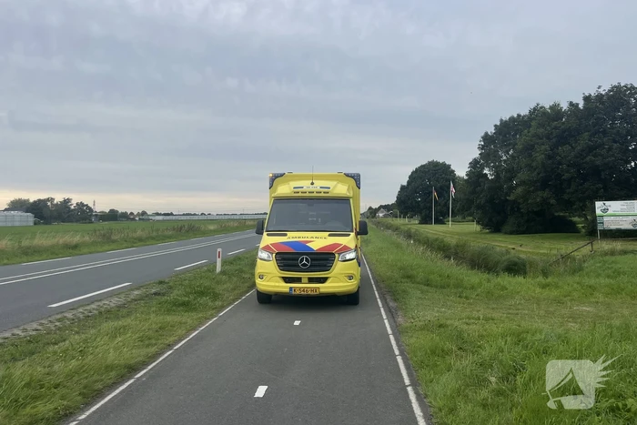 Persoon op scootmobiel raakt te water