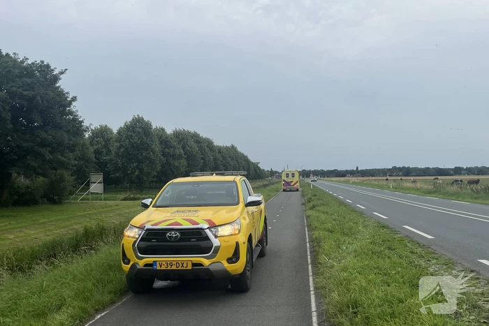 Persoon op scootmobiel raakt te water