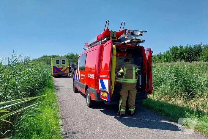 Persoon op scootmobiel belandt in water