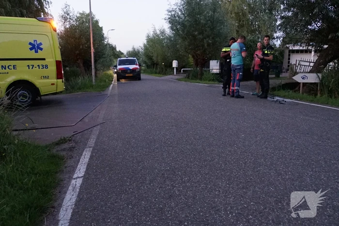Scooterrijder raakt te water
