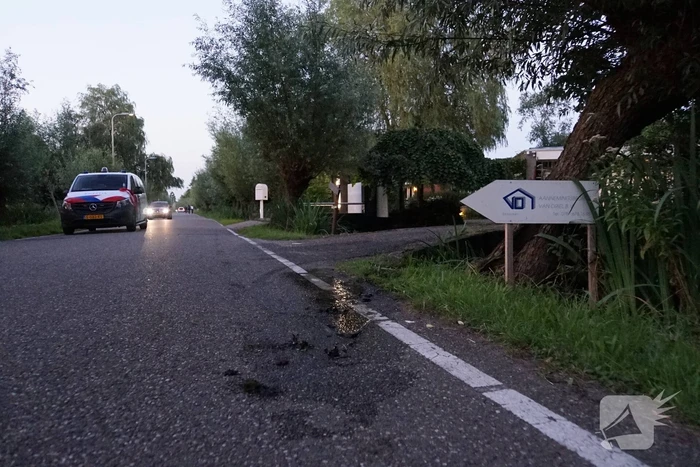 Scooterrijder raakt te water