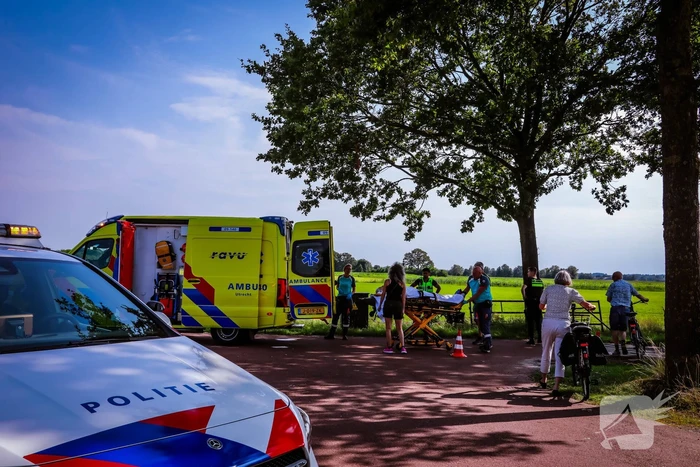 Vrouw slaat om met scootmobiel