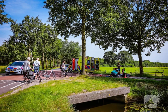Vrouw slaat om met scootmobiel