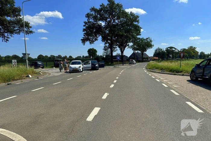 Schade na botsing op kruising