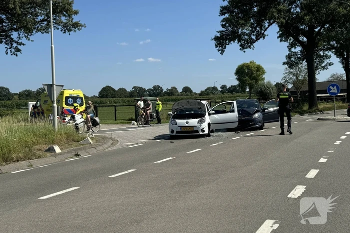 Schade na botsing op kruising