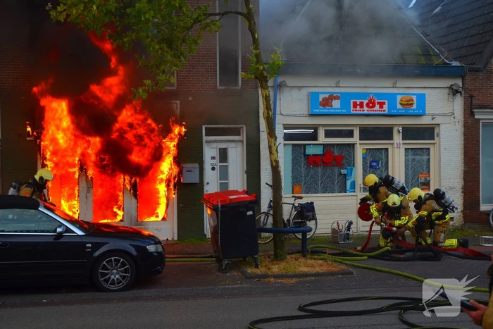 Grote uitslaande brand in pizzeria