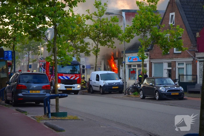 Grote uitslaande brand in pizzeria