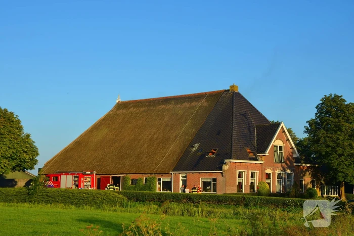 Brand in grasmaaier in woonboerderij