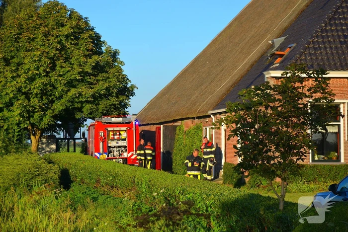 Brand in grasmaaier in woonboerderij