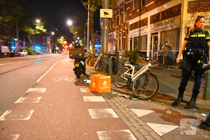 Maaltijdbezorger gewond bij botsing met concurrent