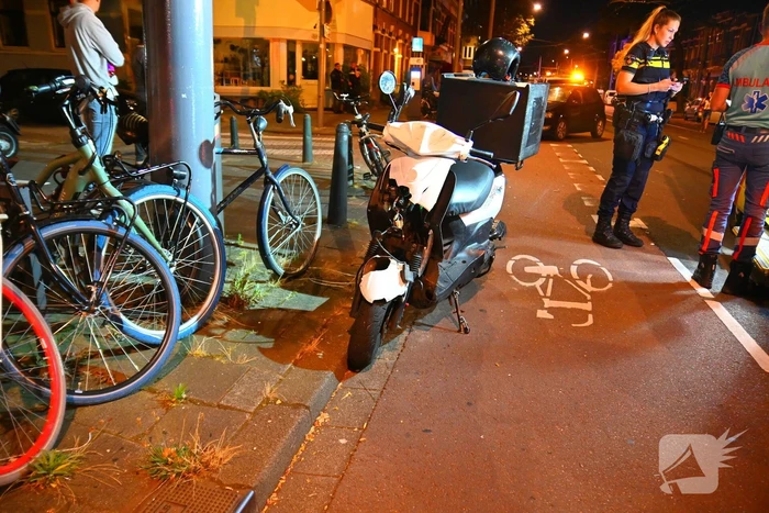 Maaltijdbezorger gewond bij botsing met concurrent