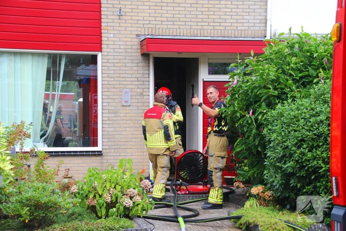 Woning vol rook door brand