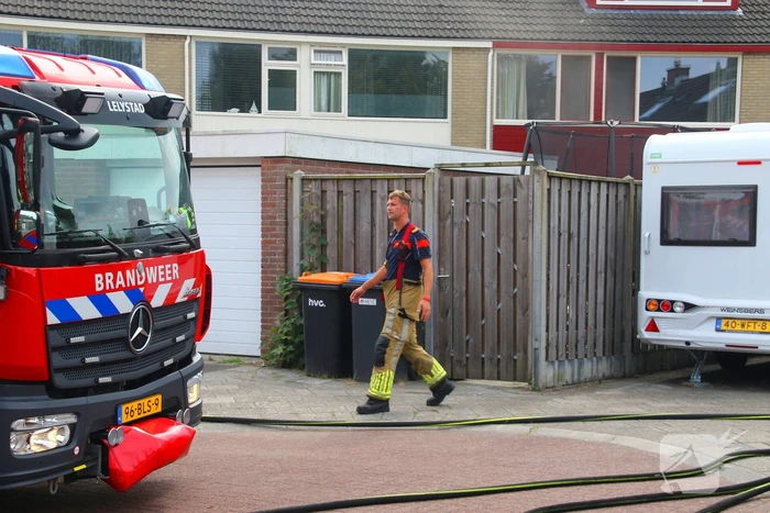 Woning vol rook door brand