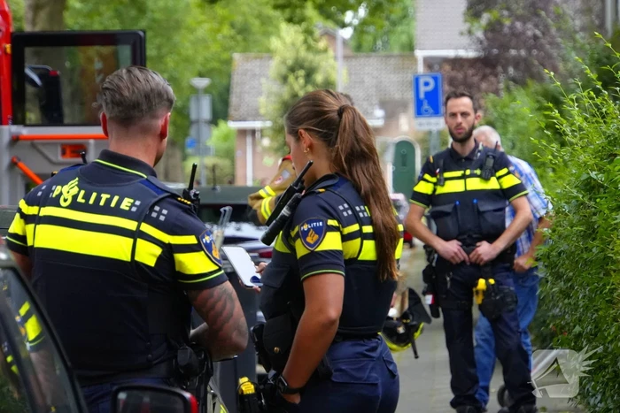 Persoon ademt rook in bij keukenbrand