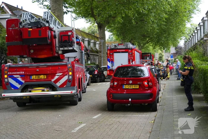 Persoon ademt rook in bij keukenbrand