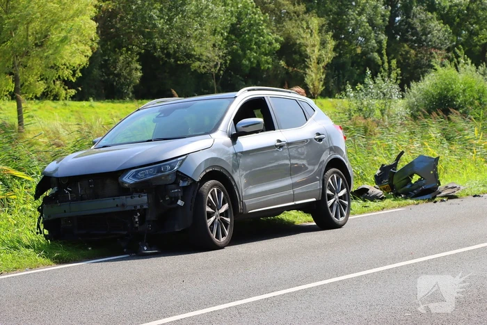 Flinke schade bij ongeval tussen dienstvoertuig en personenauto