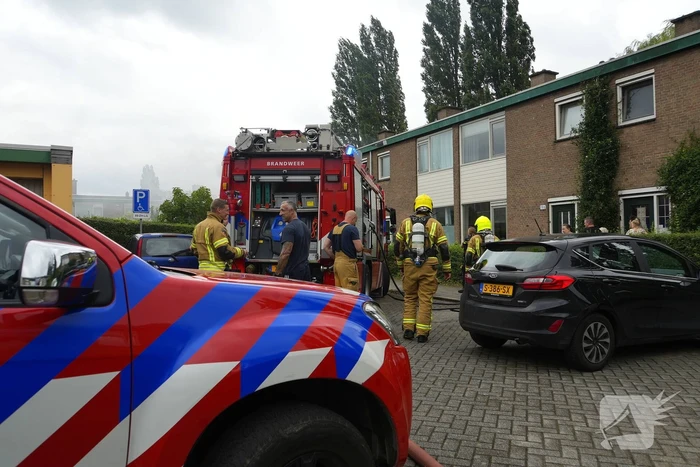 Uitslaande woningbrand door wasmachine