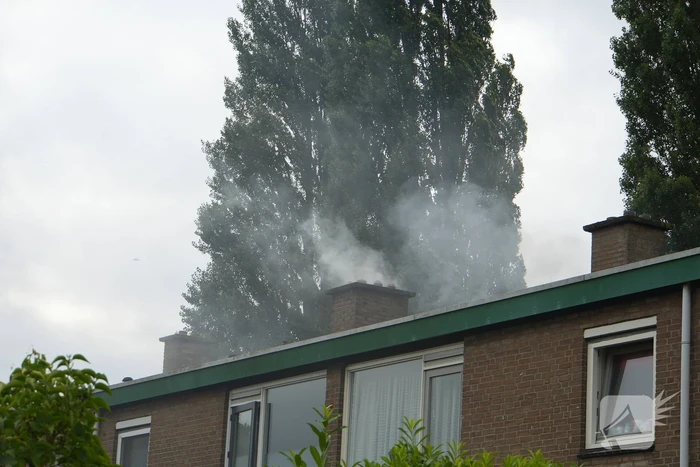Uitslaande woningbrand door wasmachine