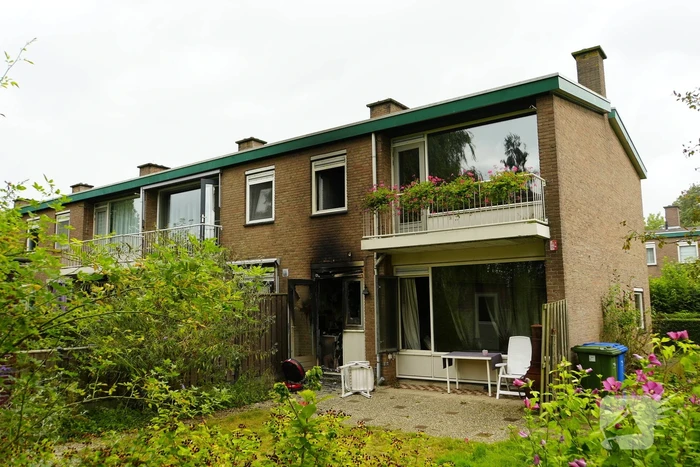 Uitslaande woningbrand door wasmachine