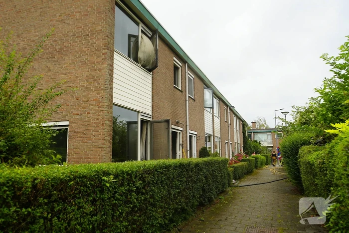 Uitslaande woningbrand door wasmachine