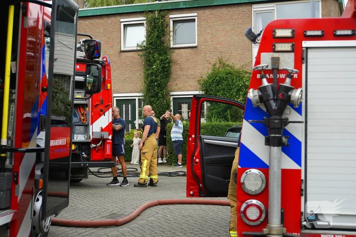 Uitslaande woningbrand door wasmachine