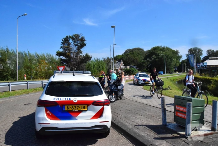 Persoon op fiets aangereden door scooterrijder
