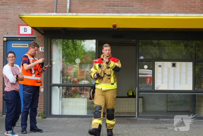 Rookontwikkeling op vijfde verdieping door keukenbrand