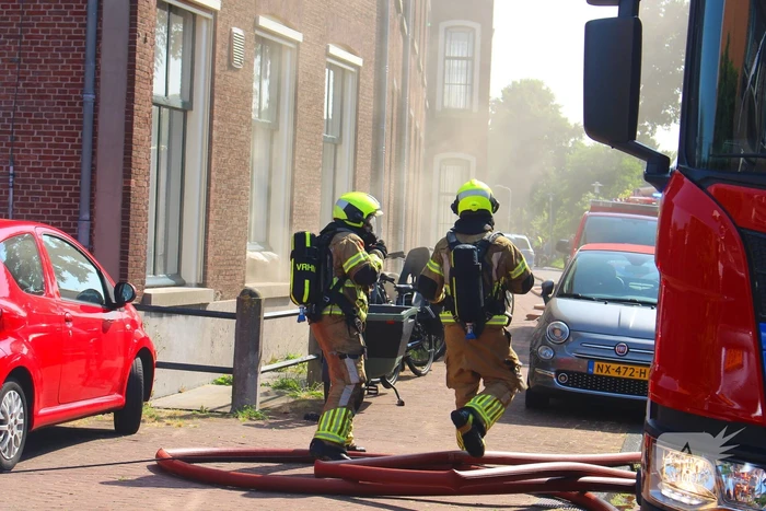 Vluchtelingenopvang ontruimd door brandend bankstel