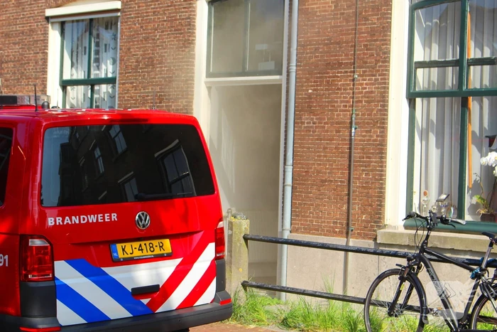 Vluchtelingenopvang ontruimd door brandend bankstel
