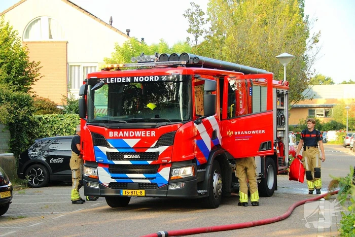 Flinke schade aan garage door scooterbrand