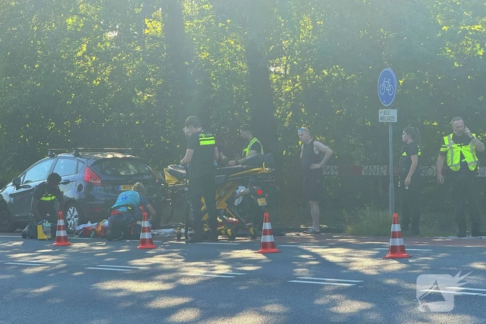 Automobilist schept motorrijder