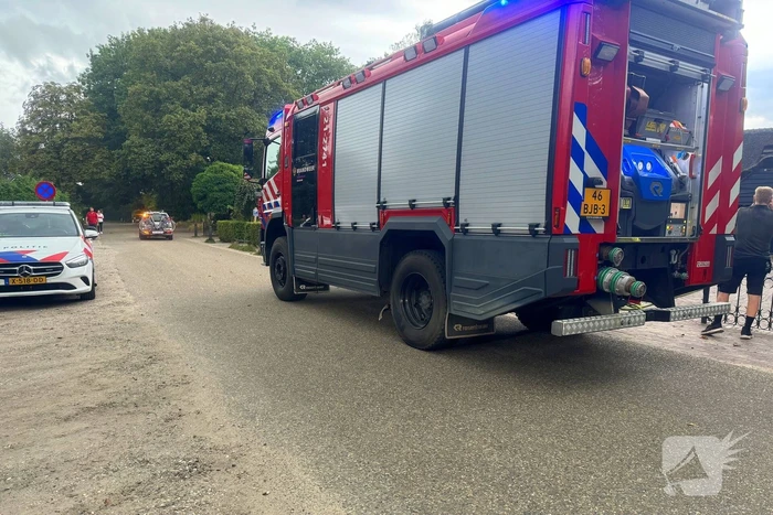 Brand in wasmand vol handdoeken bij restaurant