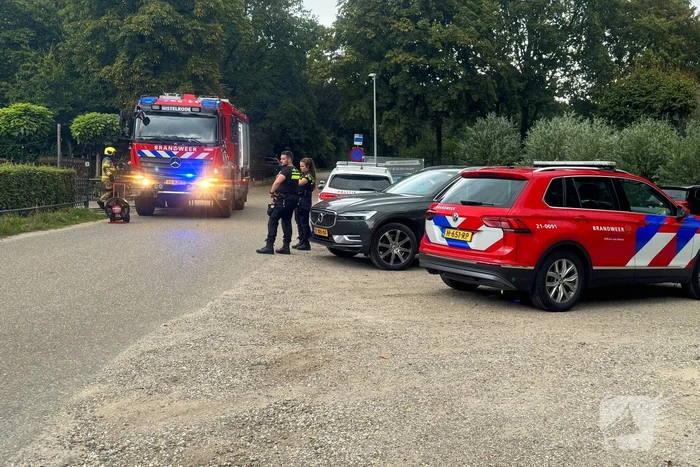 Brand in wasmand vol handdoeken bij restaurant
