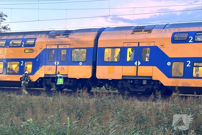 Rookontwikkeling onder trein door vastgelopen remmen