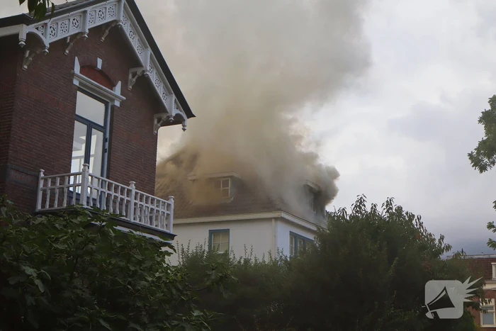 Grote rookontwikkeling bij woningbrand