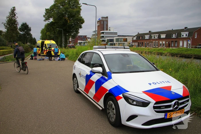 Wielrenner en fietser botsen op elkaar