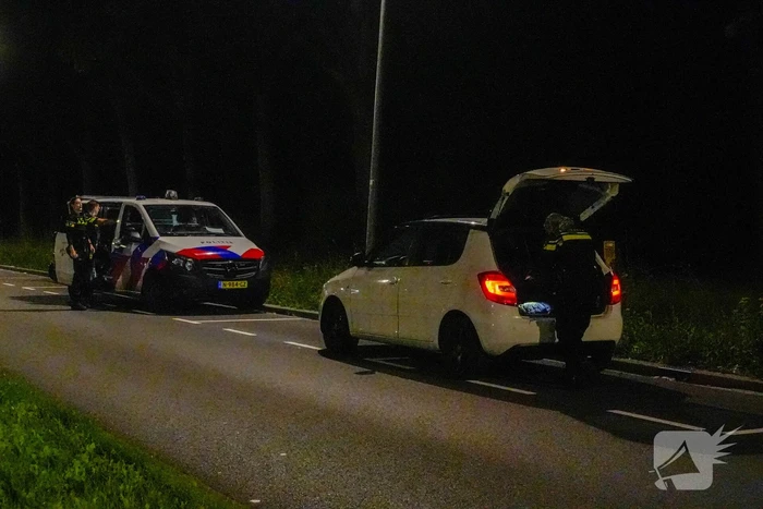Persoon overvallen die in auto zat
