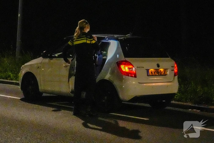 Persoon overvallen die in auto zat