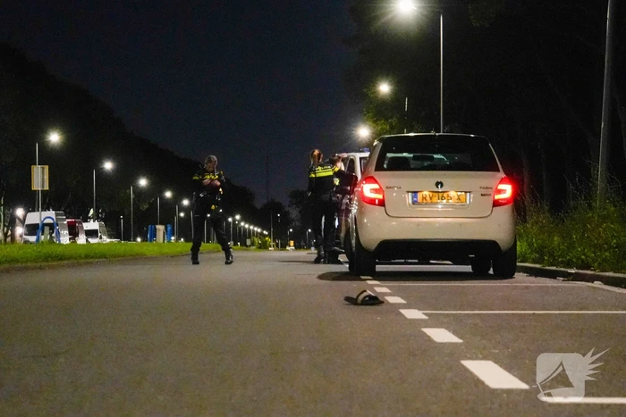 Persoon overvallen die in auto zat