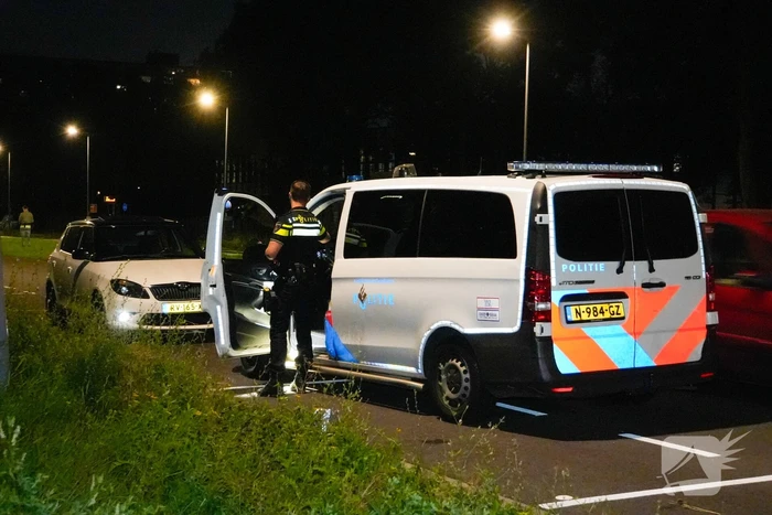 Persoon overvallen die in auto zat