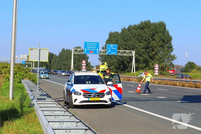 Schade bij kop-staart botsing op snelweg