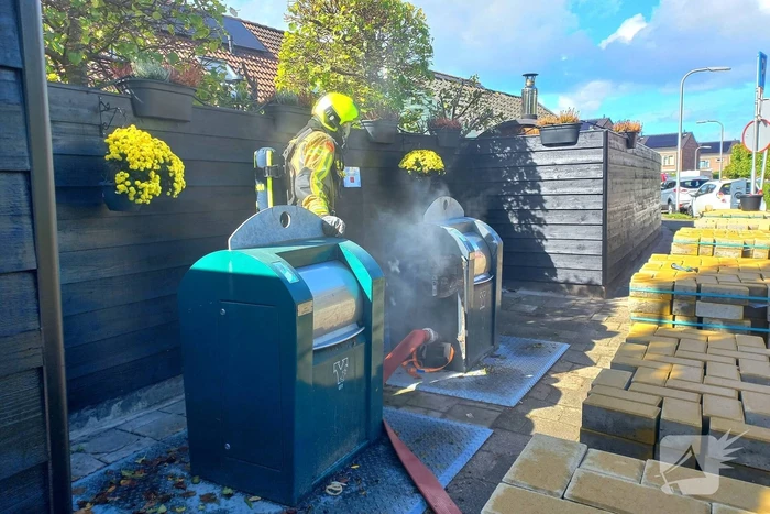 Brandweer laat ondergrondse container vollopen met water om brand te doven