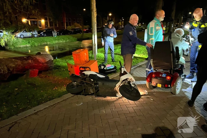 Scootmobieler aangereden door bezorger