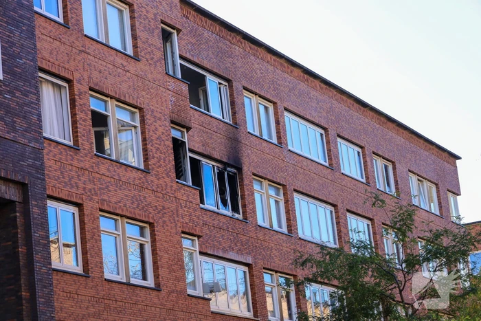 Uitslaande brand in flatwoning