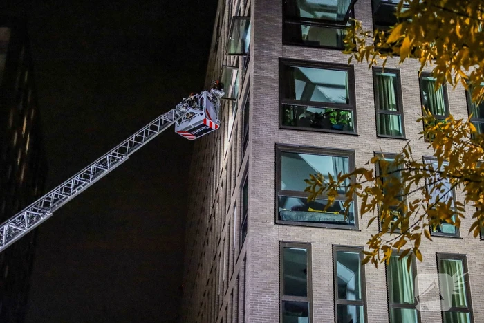 Brand in woning bij appartementencomplex