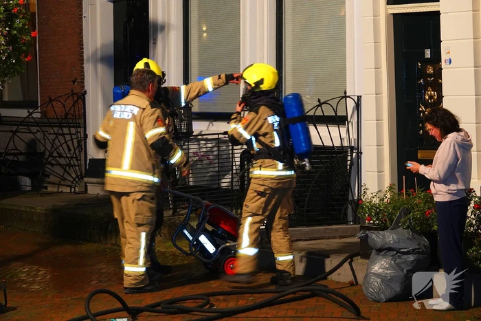 Brand in winkelpand snel onder controle