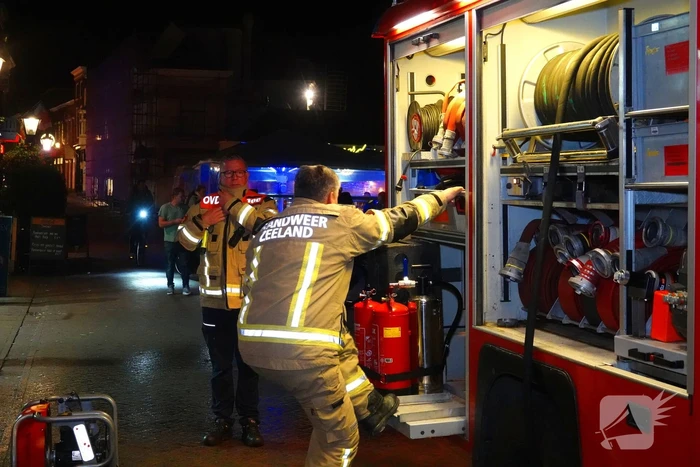 Brand in winkelpand snel onder controle