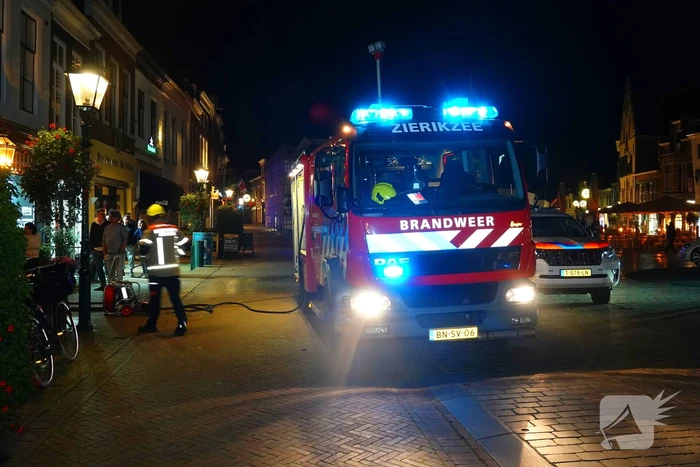 Brand in winkelpand snel onder controle