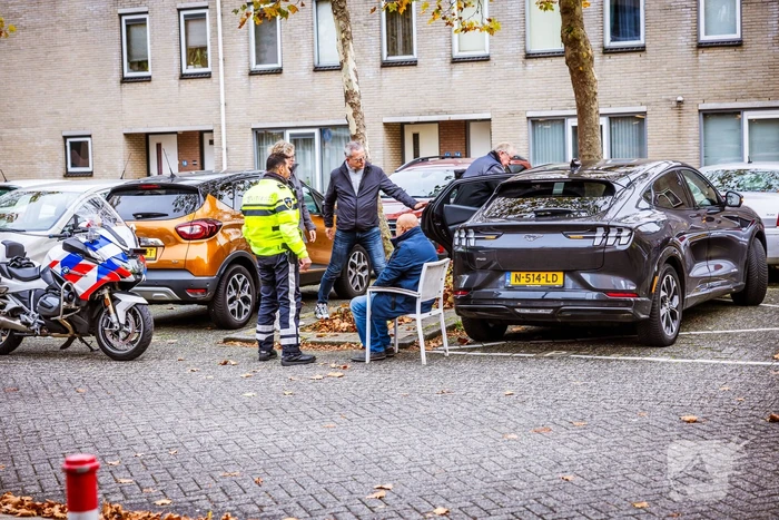 Persoon bekneld in auto