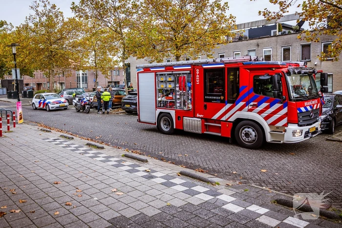 Persoon bekneld in auto
